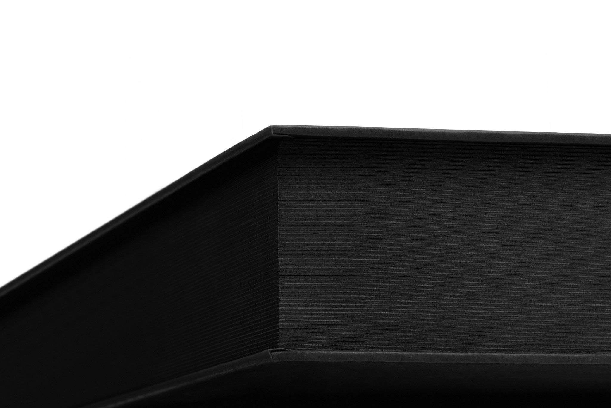 Side profile of dbrand Manifesto, showcasing page thickness