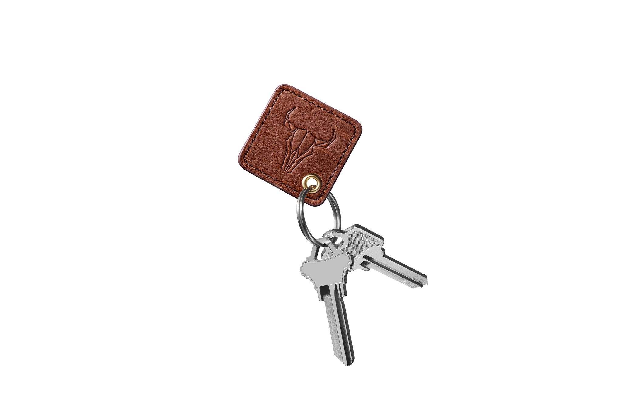 A brown leather tag on a set of keys