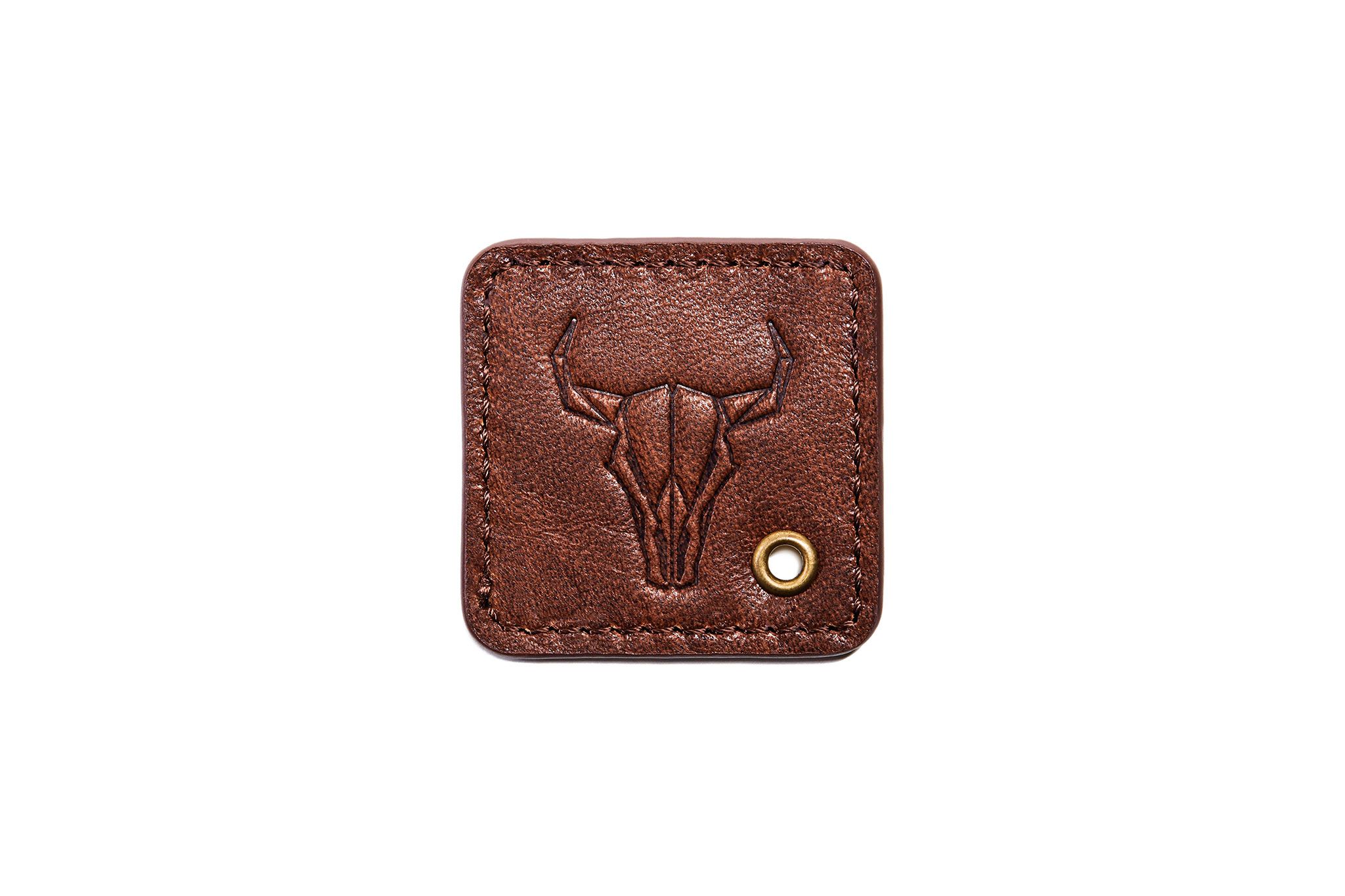 A brown leather keytag